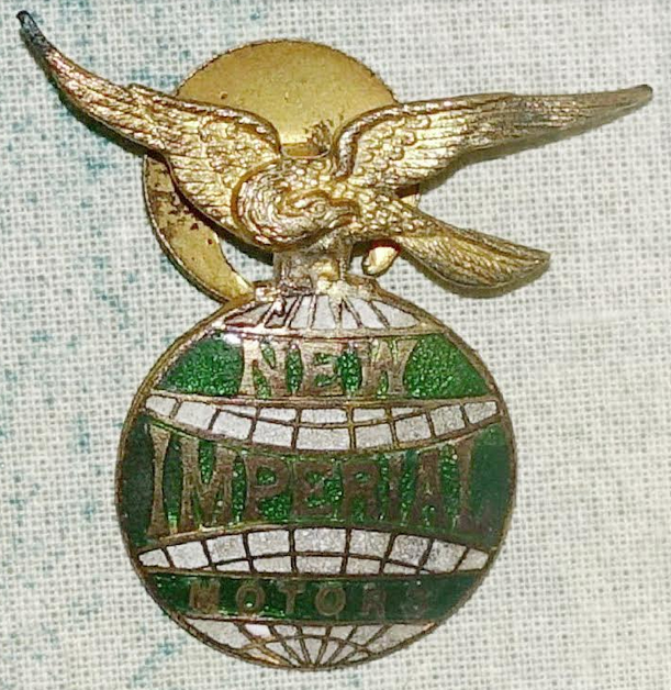 CARTOONS NEW IMP BADGE