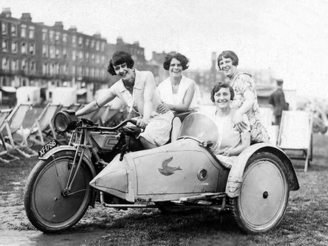 1920 Four Ladies sitting on a 1920 New Gerrard motorcycle