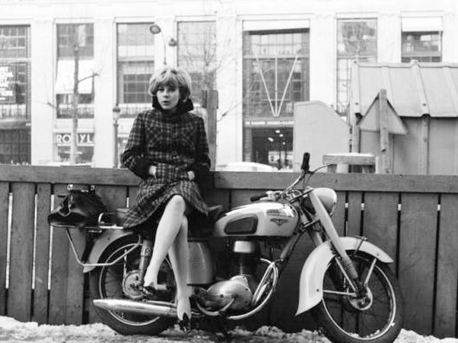 Sylvie Vartan sitting on a Motobecane Mobyclub 56 1960s